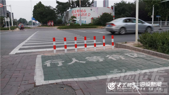 绿灯啥时候亮你说了算 行人请求式过街信号灯亮相济宁-3.png