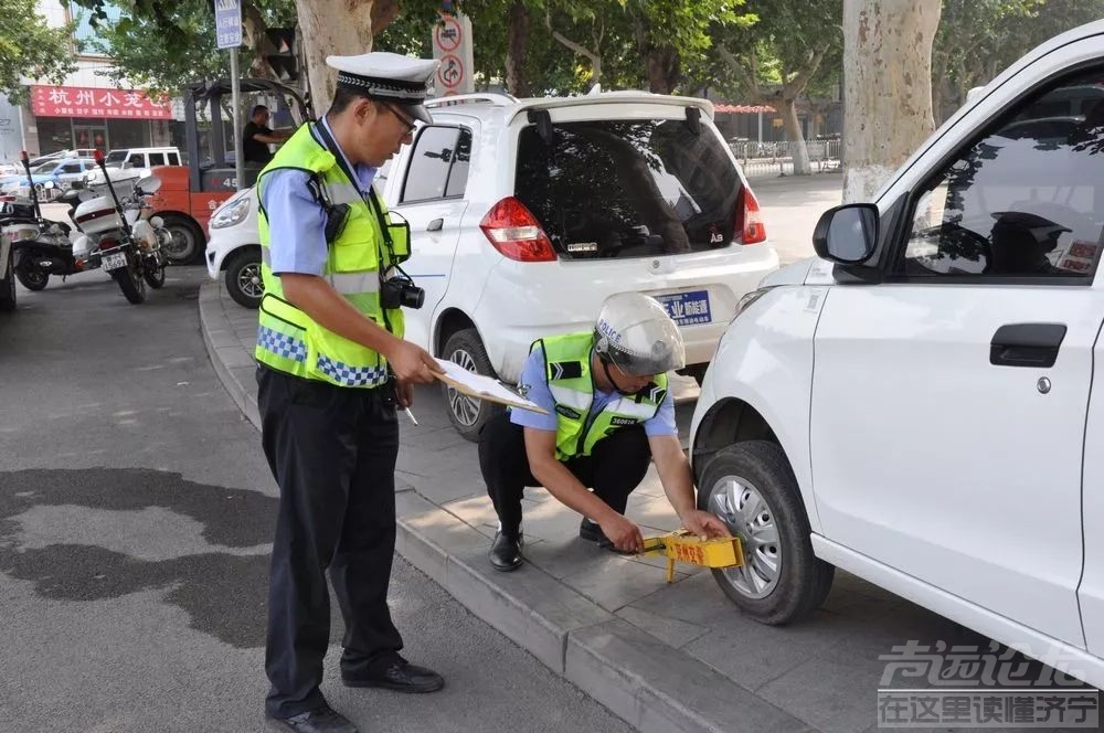 电动车乱停？分分钟拖走-2.jpg