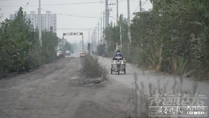 济宁有条路跨着两个县，两半幅路况却是“两重天”-2.jpg